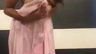 Shapely boobed desi bhabhi stripping saree