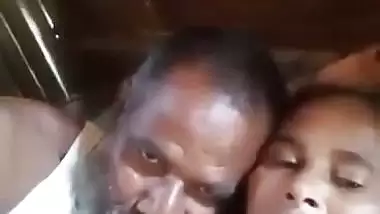 An old man enjoys the boob sucking of a desi lady